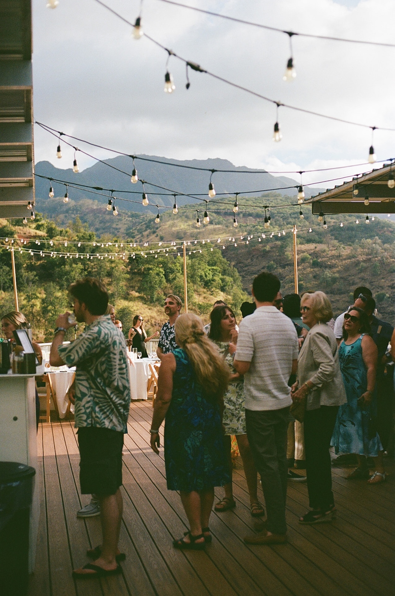 Guests celebrating on the dance floor at a lively reception hosted at a stunning Wedding Venues in Hawaii.